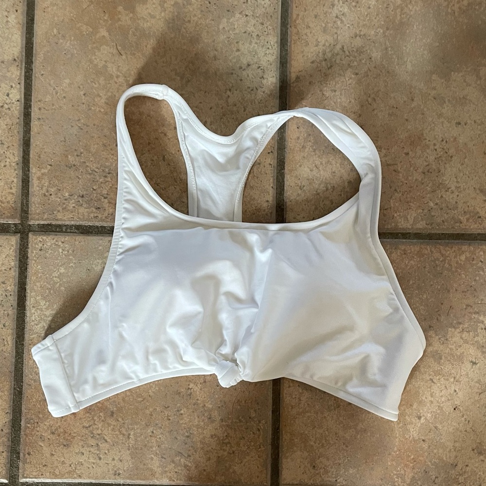 NWOT. Racer back, knot front bikini top